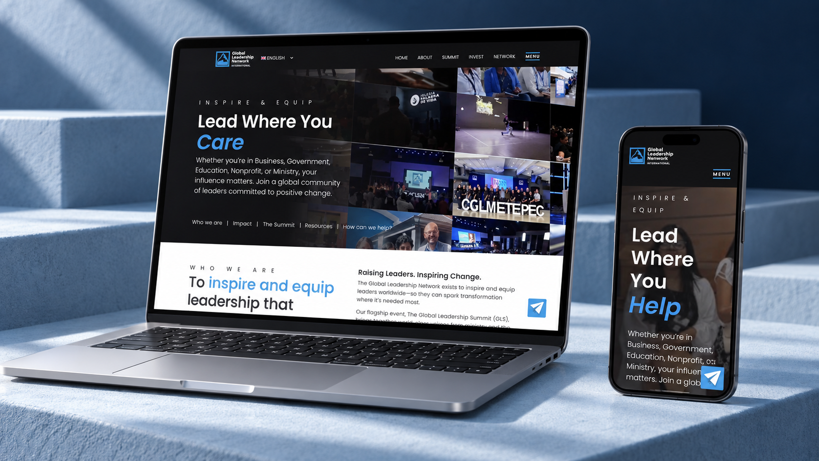 GLNI homepage displayed on a silver laptop and black phone in a blue architectural studio